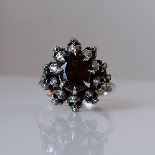 PATES garnet halo ring