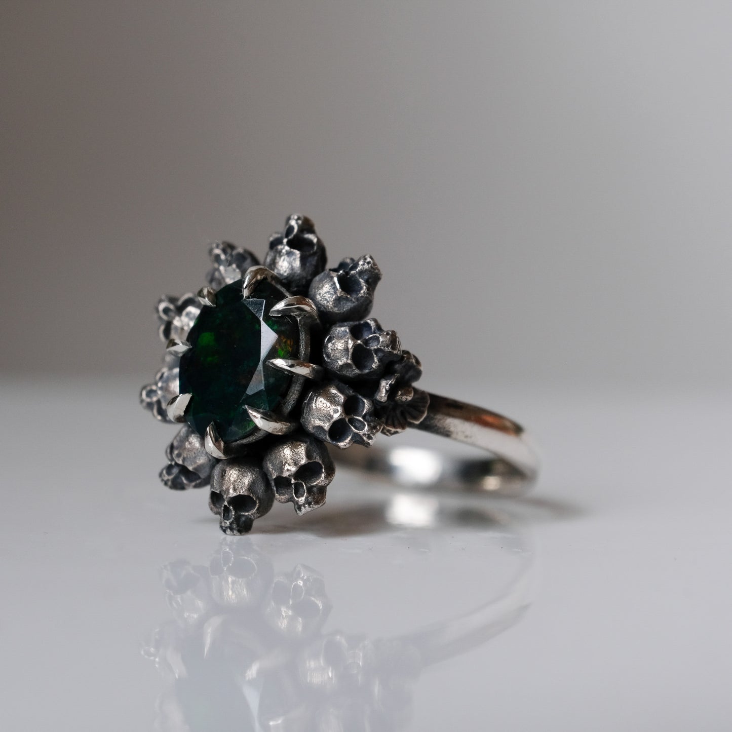 PATES black opal halo ring